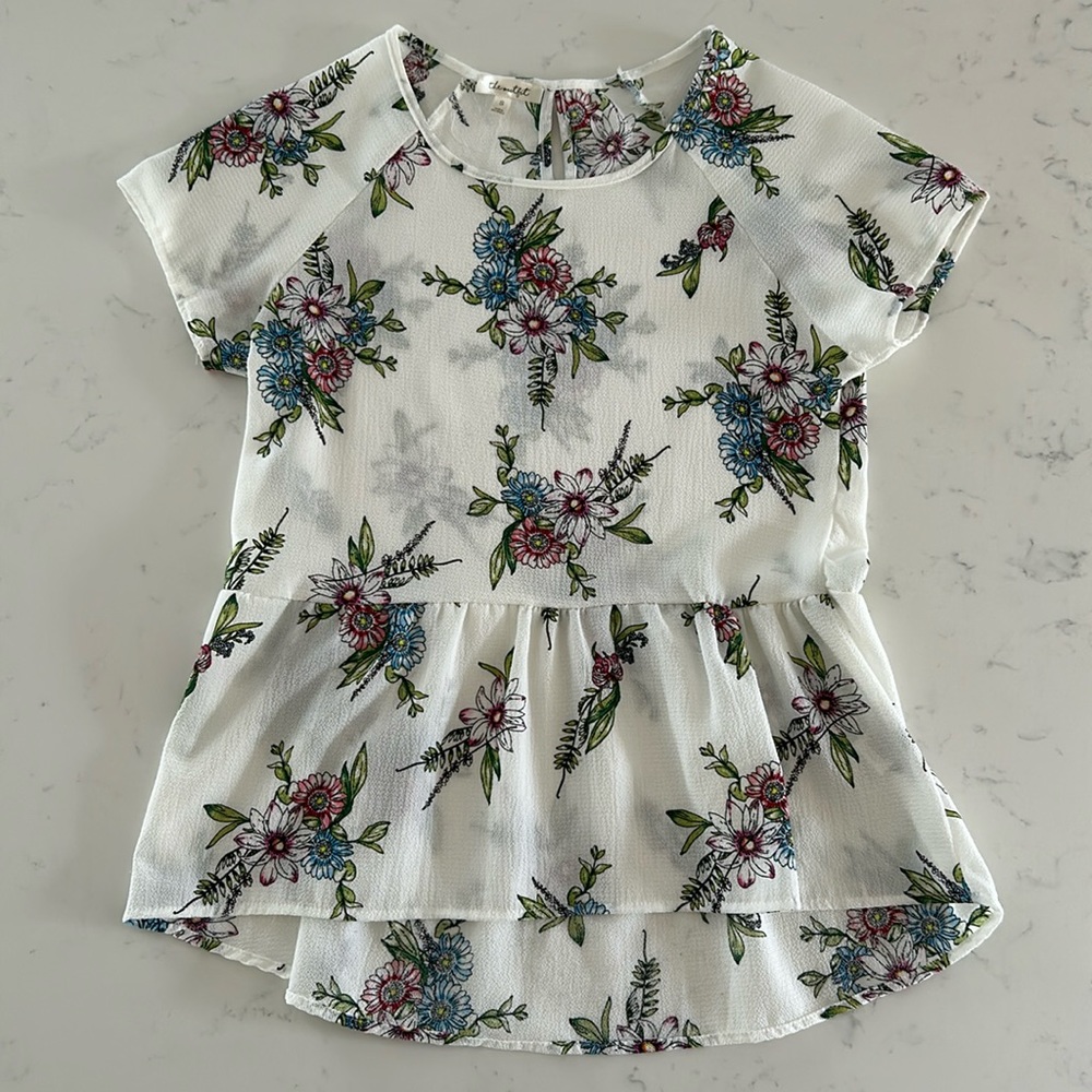 The Outfit Women’s, Small Peplum Short Sleeve Top. White/pink/green/blue flowers